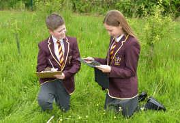 windsor olympus academy students in forest school doing research 1
